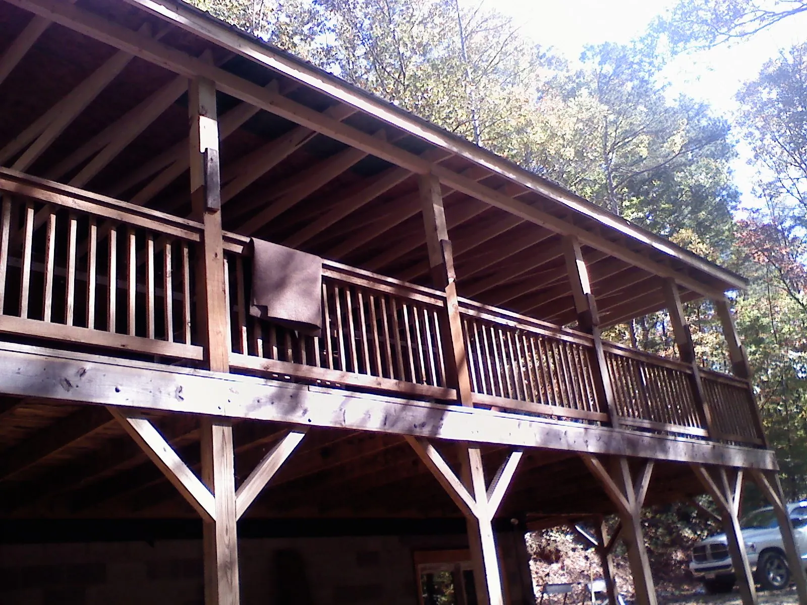 Timber framing under a new elevated porch and deck — Roof Leak Repair in Bay City by Roofing Brothers